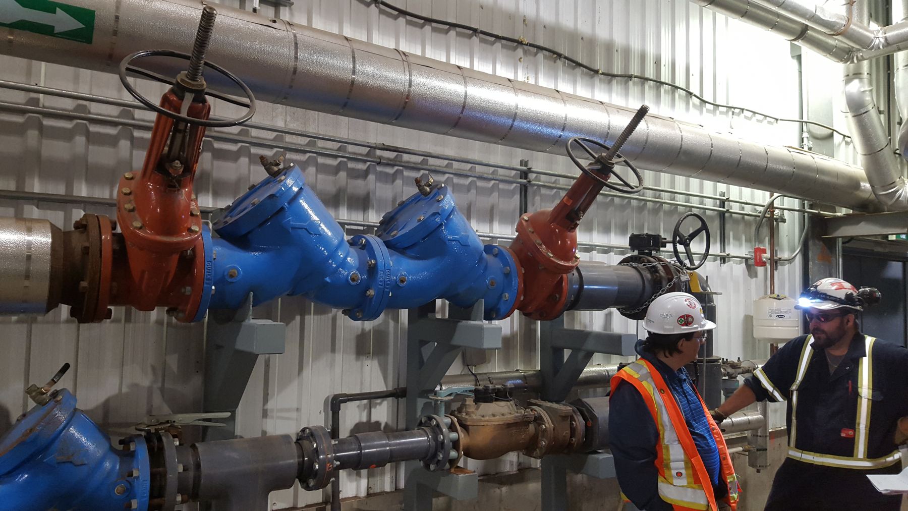 Large-diameter valves and strainers in a municipal pump room